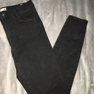 GARAGE Black Light Washed Skinny Jeans.
